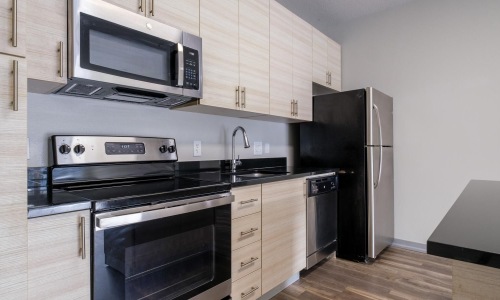 a kitchen with stainless steel appliances