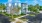 a building with trees and grass