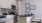 a kitchen with white cabinets