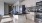 a kitchen with a bar and oven