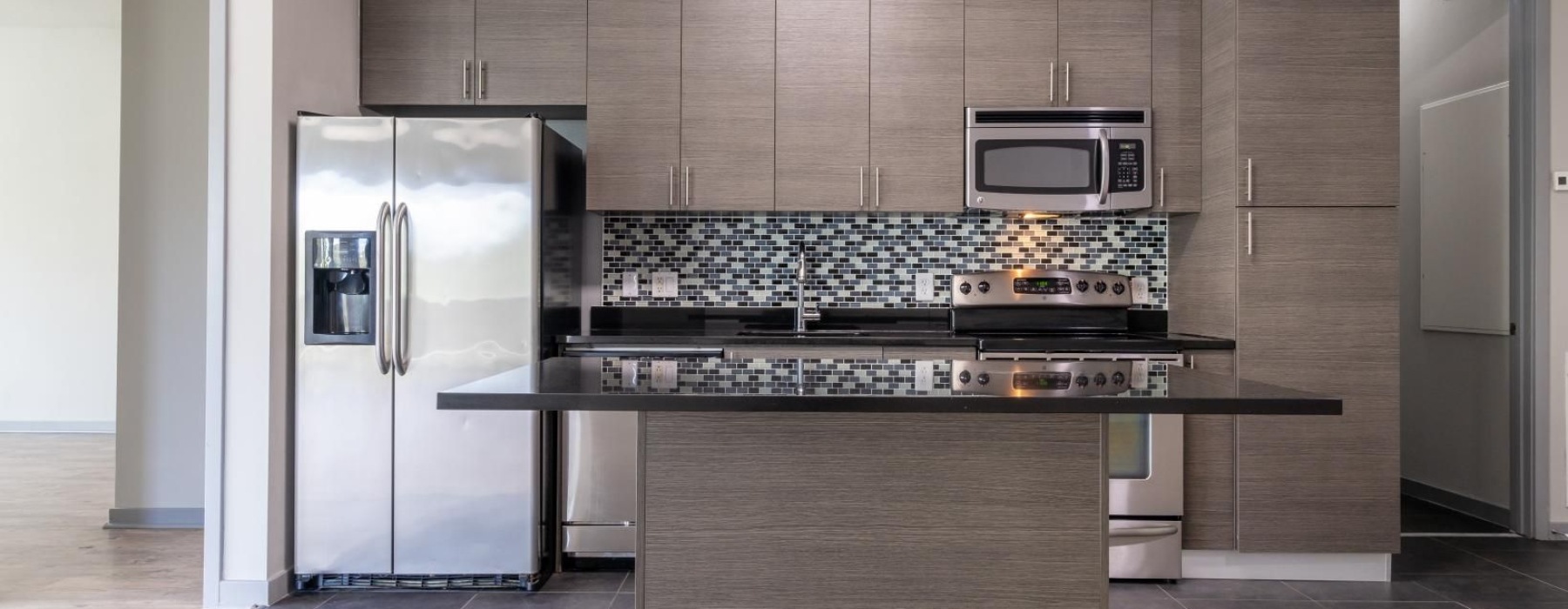 a kitchen with stainless steel appliances