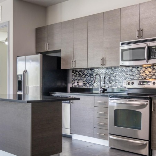 Beautiful kitchens with designer finishes a kitchen with stainless steel appliances